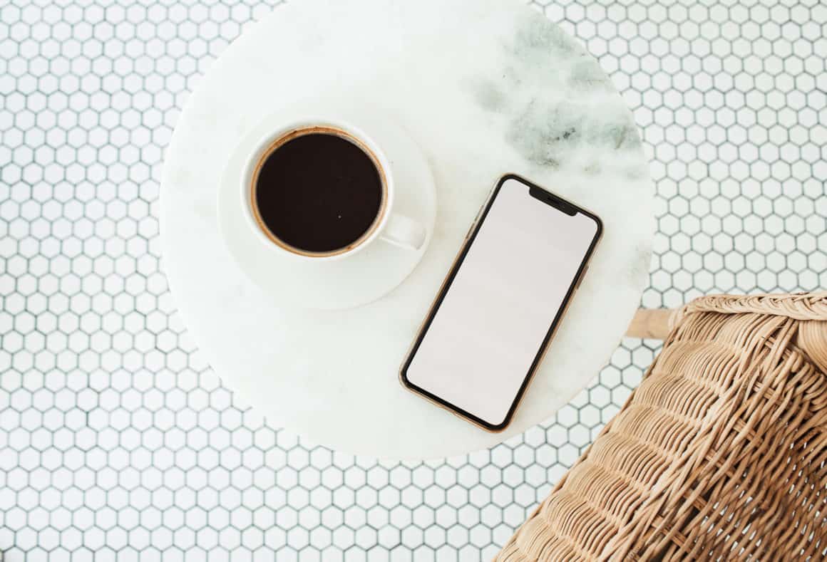 mobile-phone-coffee-on-marble-table-flat-layout