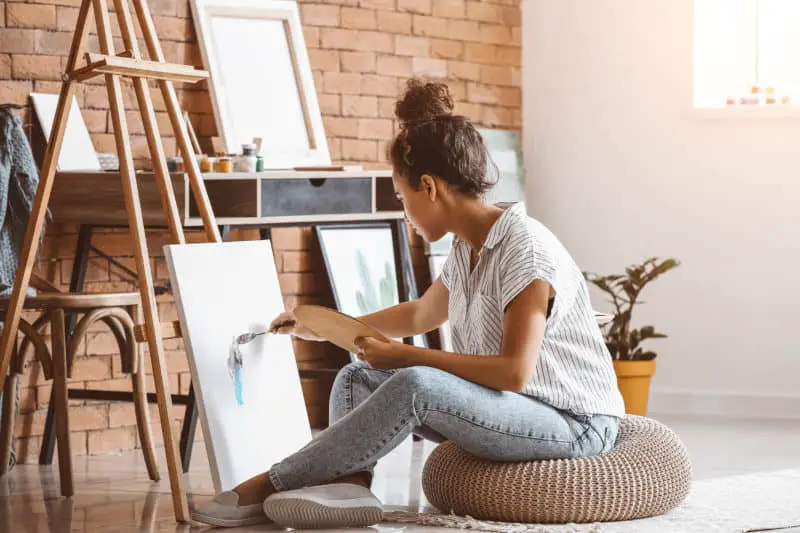 woman-painting-on-an-art-canvas