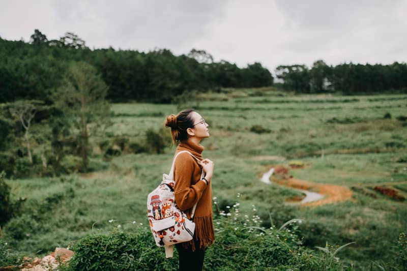 woman-traveling-nature-setting-intention-to move-on