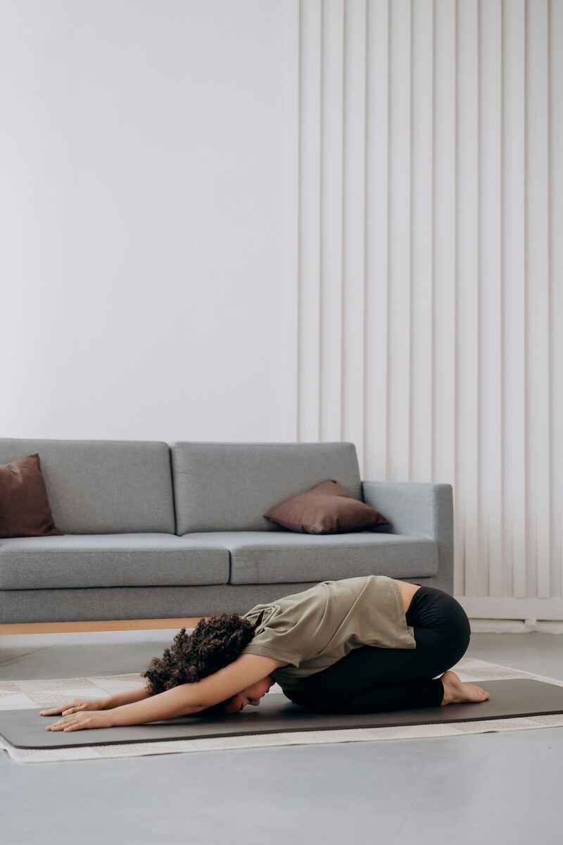 self-healing-technique-woman-doing-child's-pose-yoga